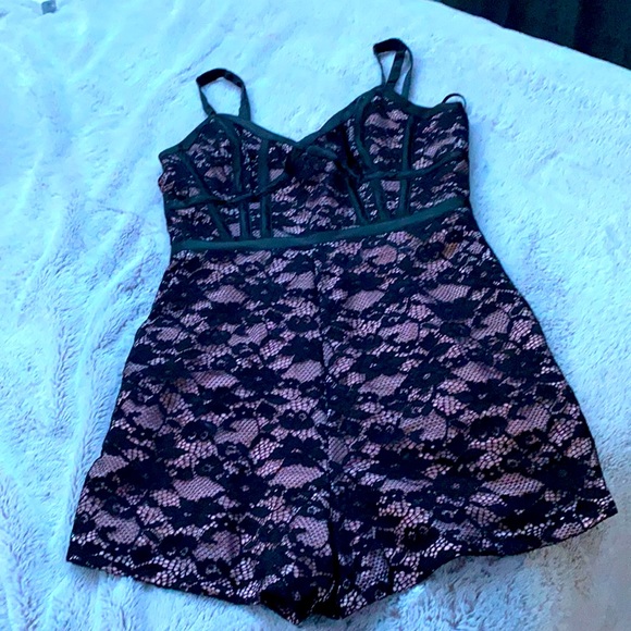 Bebe romper size M color black lace with pink